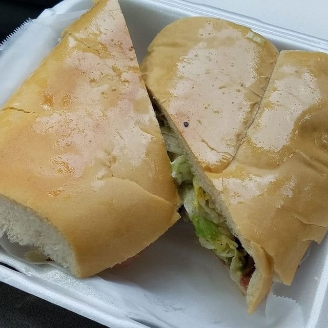 TRIPLE MEAT SANDWICH AND FRIES.